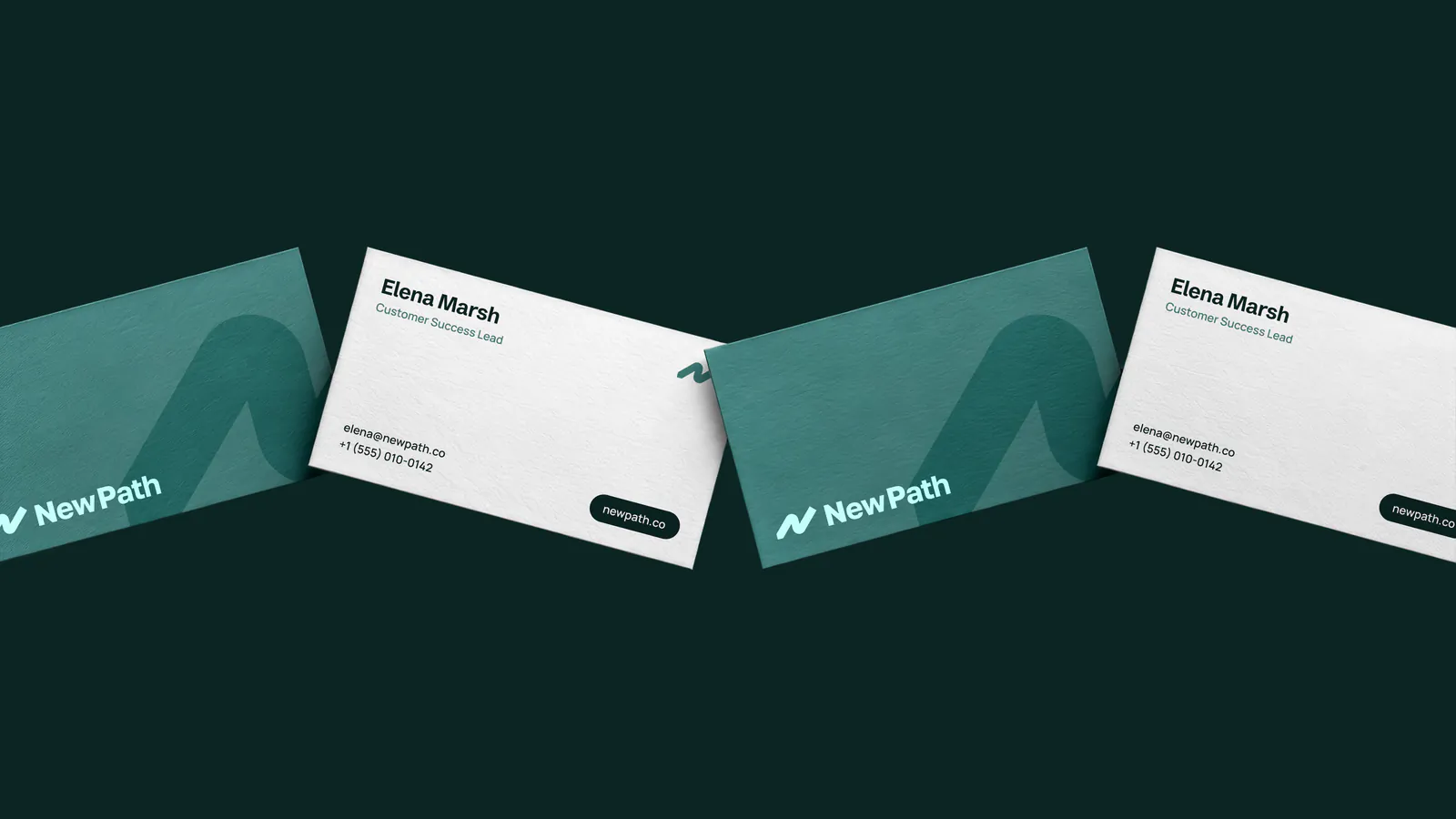 New Path business cards on dark green, with the wordmark and the N path mark
