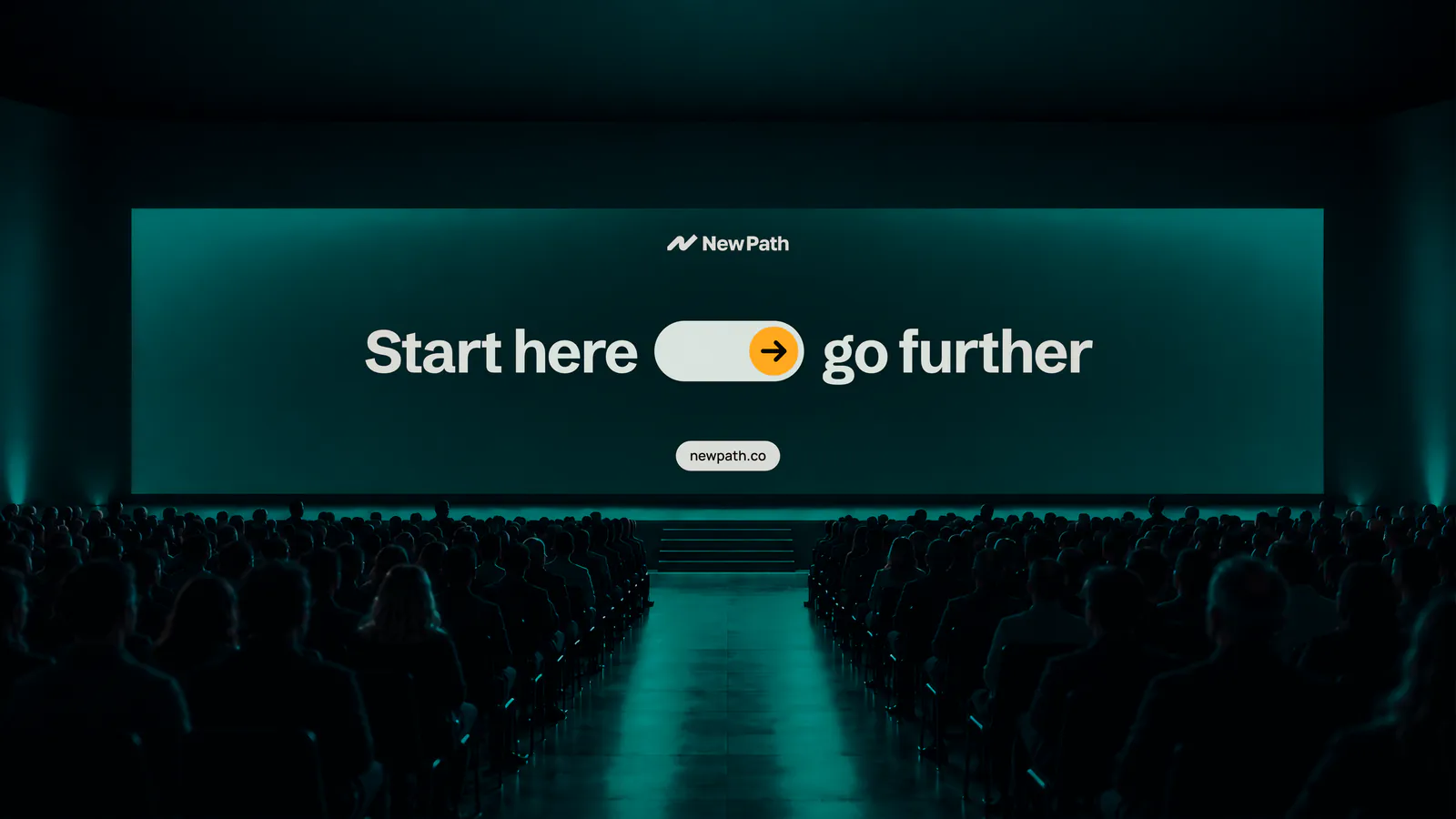 Stage screen reading Start here, go further, in front of an audience